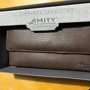 Brown leather clutch wallet
